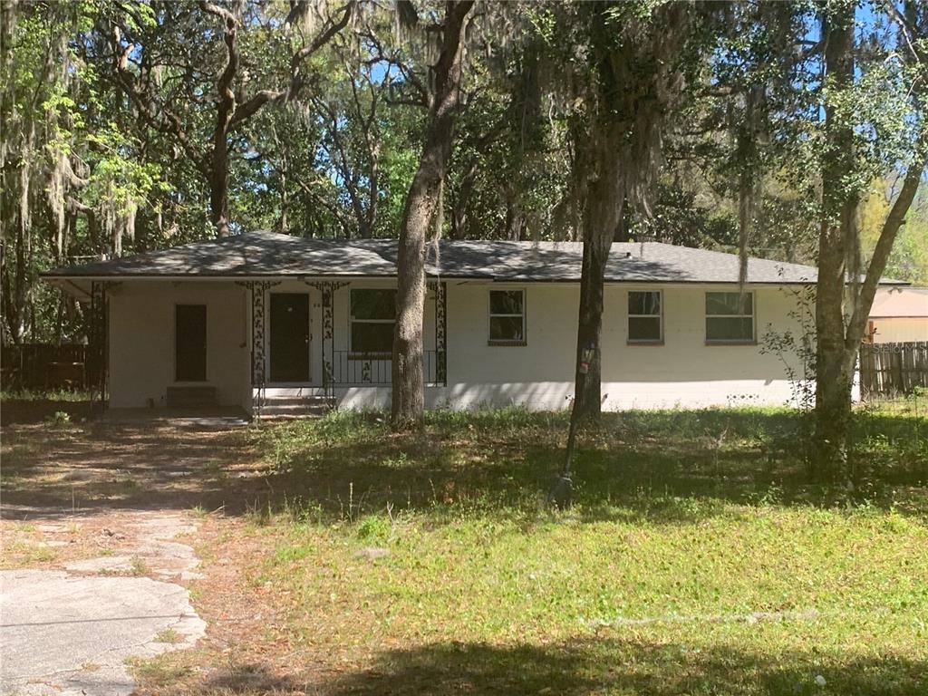3055 Oak Road Orange Park, FL 32065 - Photo 2 of 13 a front view of a house with a yard