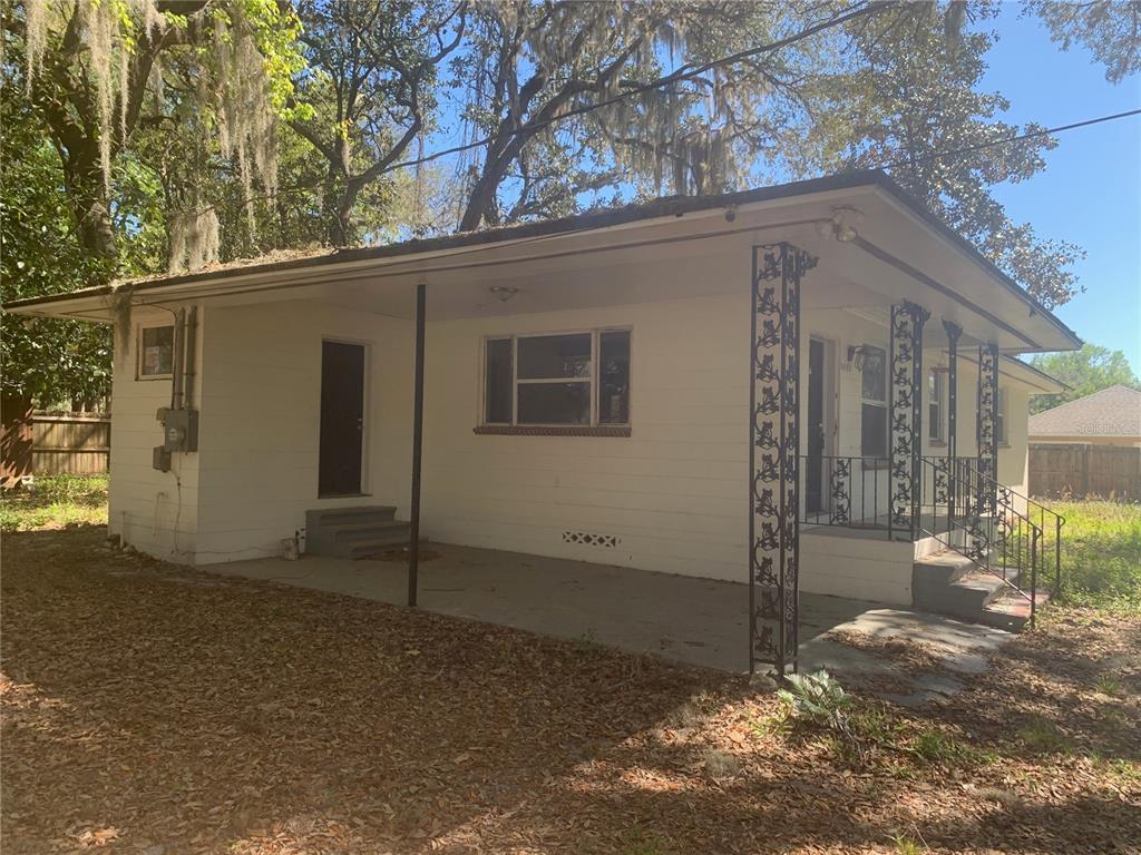3055 Oak Road Orange Park, FL 32065 - Photo 5 of 13 a view of a house with a tree