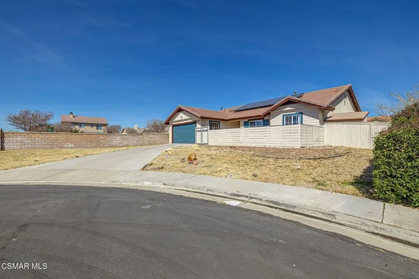 a view of a house with a ocean view