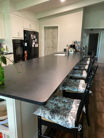 a view of a living room and dining room