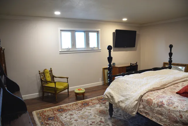 a bathroom with a double vanity sink a mirror and shower