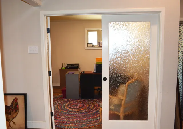 a room with furniture and a mirror