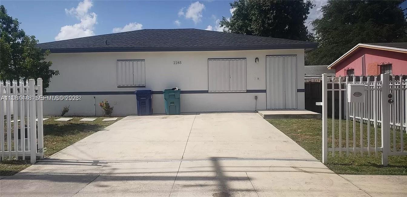 2285 Northwest 91st Street Miami, FL 33147 - Photo 2 of 9 a view of backyard of the house