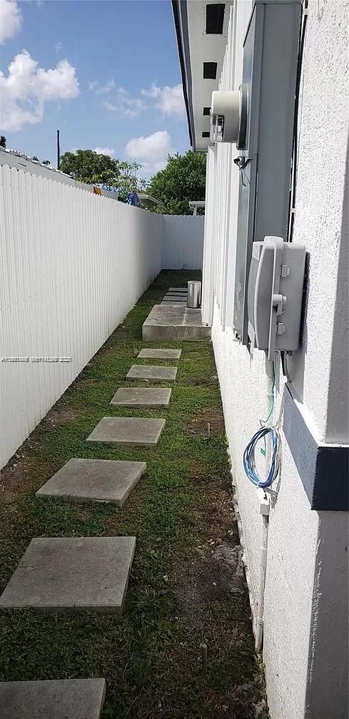 2285 Northwest 91st Street Miami, FL 33147 - Photo 8 of 9 a view of a backyard with sitting area