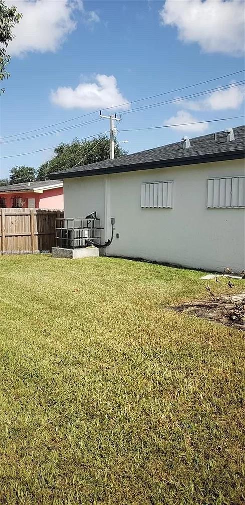 2285 Northwest 91st Street Miami, FL 33147 - Photo 9 of 9 a view of a lake with a terrace