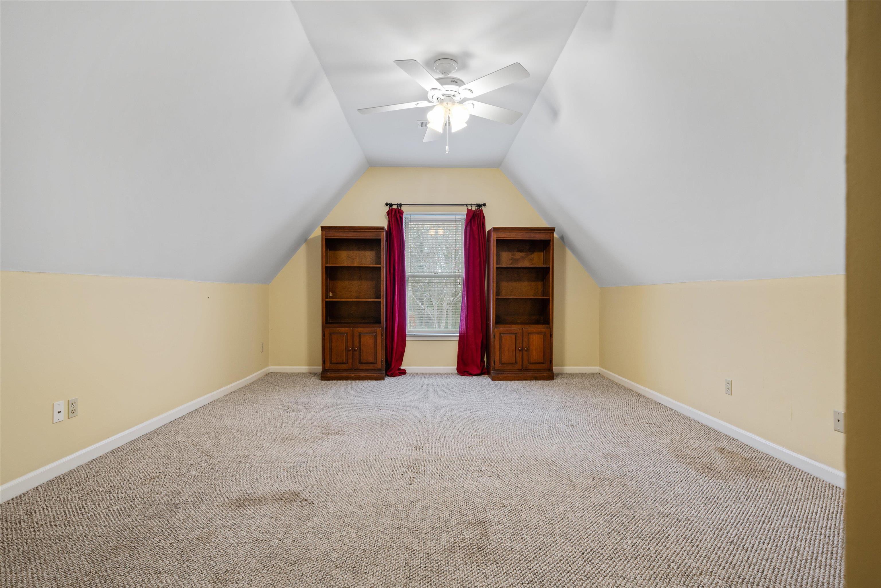 541 McElroy Road Memphis, TN 38120 - Photo 23 of 25 an empty room with windows and fan