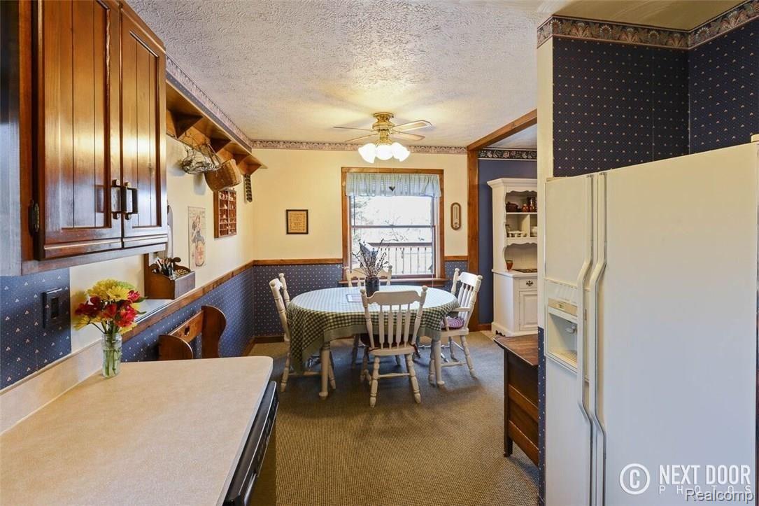 10500 West Allen Road Fowlerville, MI 48836 - Photo 15 of 42 10500 kitchen to dining.jpg