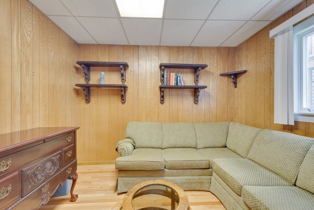 45 Jackson Road Somerville, MA 02145 - Photo 10 of 27 a living room with furniture and a air conditioner vent