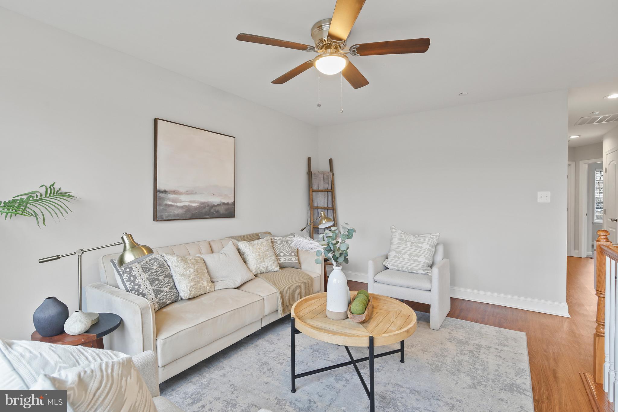 617 Cedar Hill Road Baltimore, MD 21225 - Photo 2 of 38 Living Room w/ Ceiling Fan