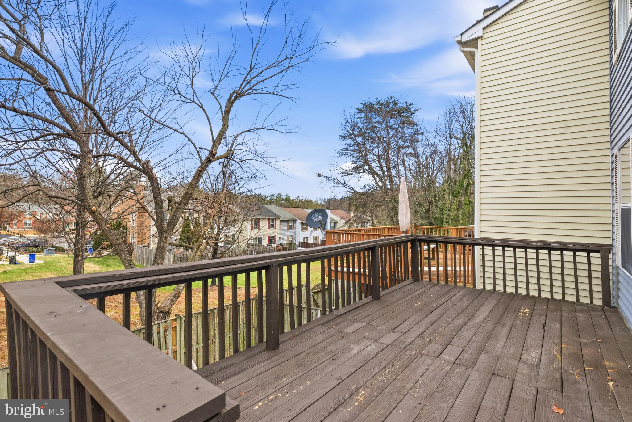 7600 Mandan Road Greenbelt, MD 20770 - Photo 15 of 42 a view of a wooden roof deck