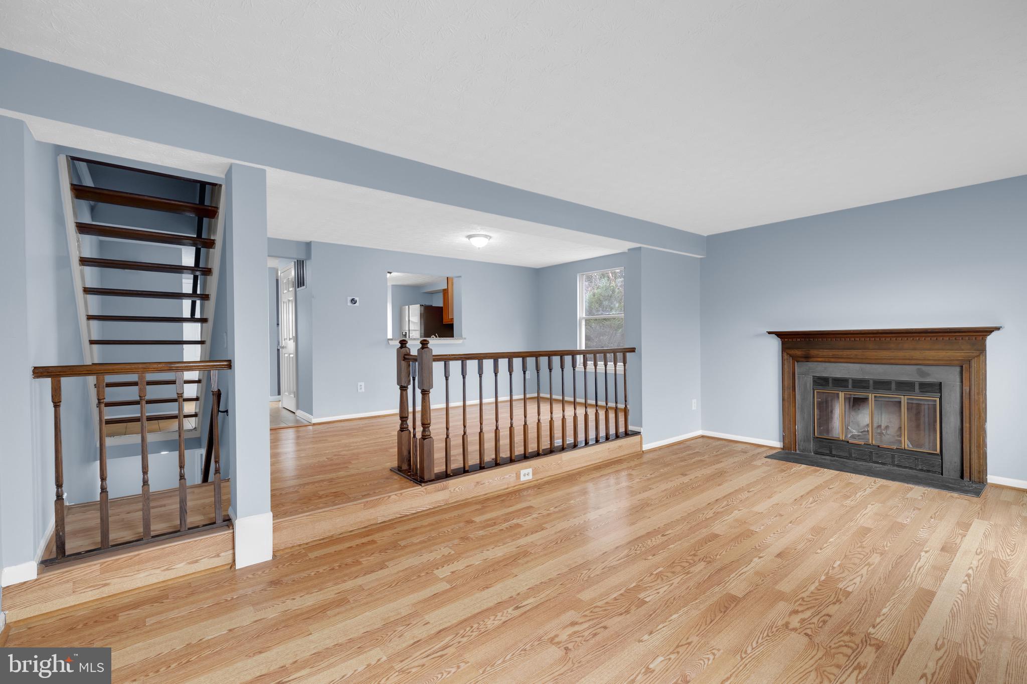 7600 Mandan Road Greenbelt, MD 20770 - Photo 19 of 42 a view of livingroom with furniture and fireplace