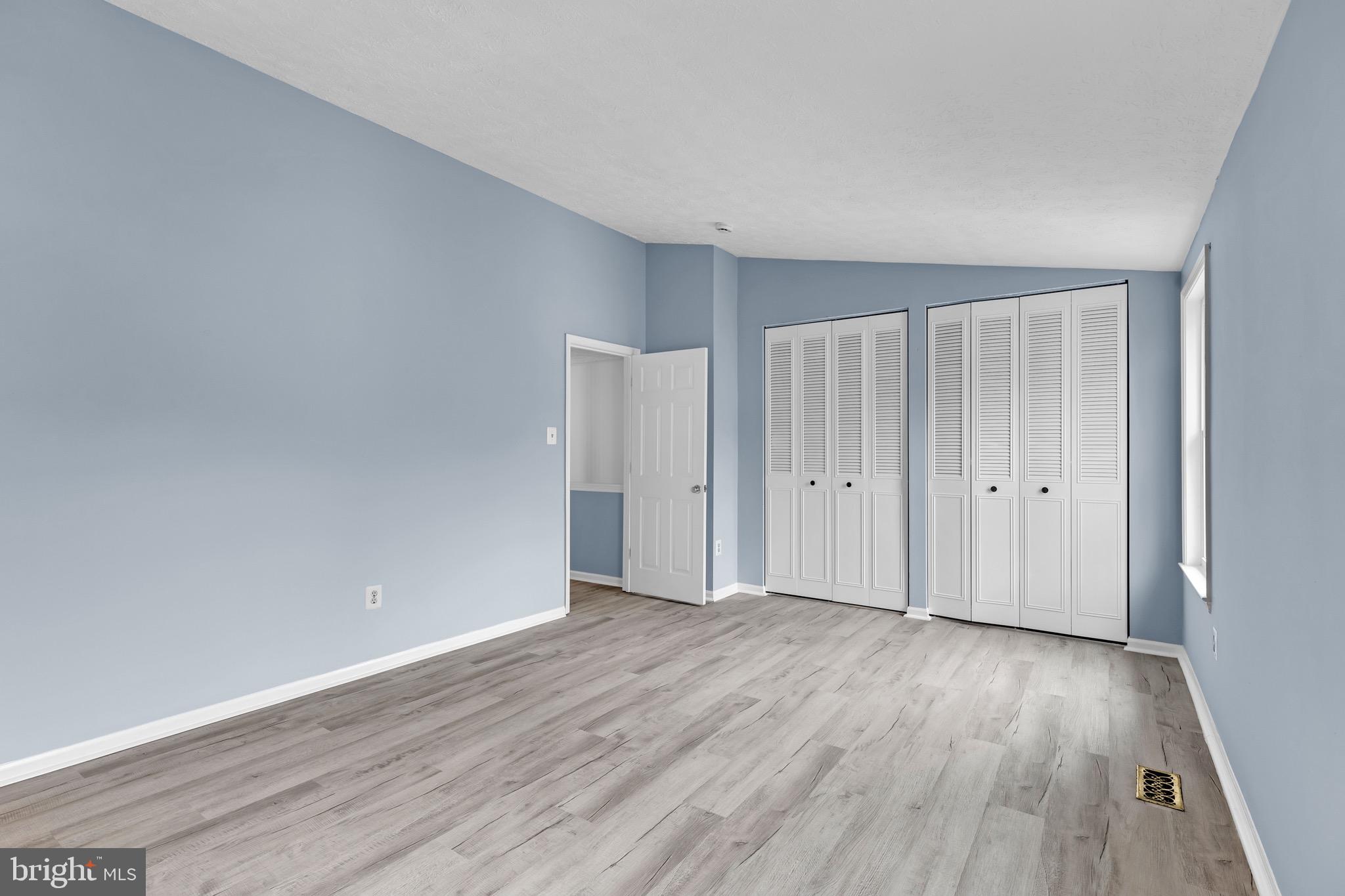 7600 Mandan Road Greenbelt, MD 20770 - Photo 23 of 42 a view of an empty room with wooden floor