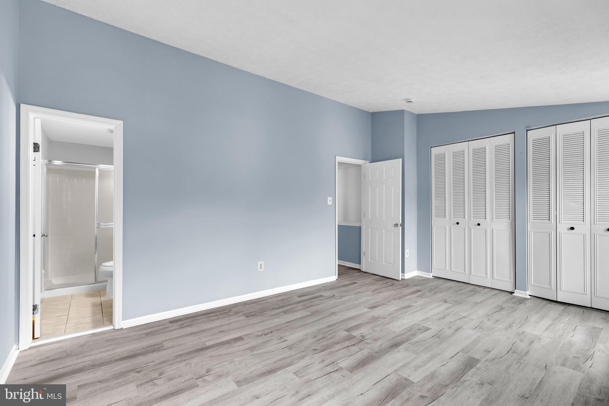 7600 Mandan Road Greenbelt, MD 20770 - Photo 24 of 42 a view of an empty room with wooden floor