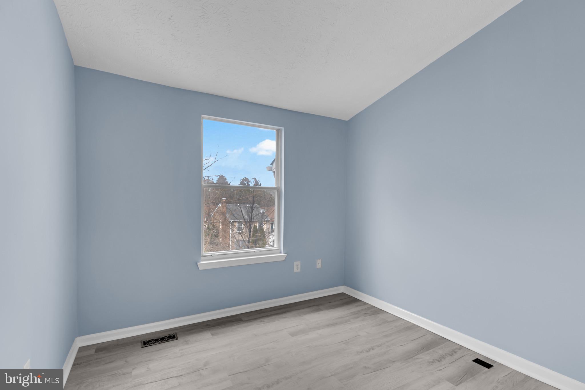 7600 Mandan Road Greenbelt, MD 20770 - Photo 26 of 42 an empty room with windows