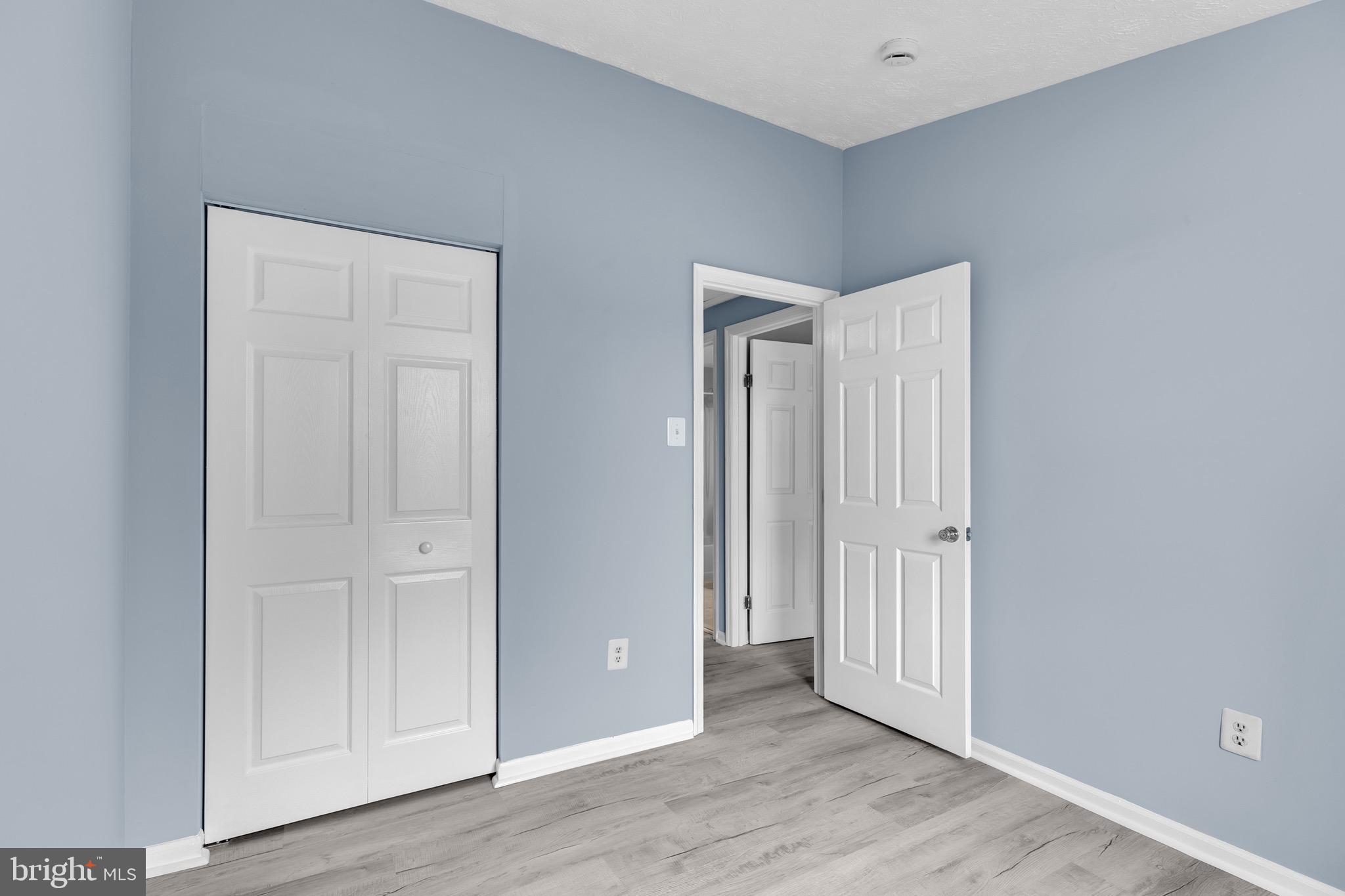 7600 Mandan Road Greenbelt, MD 20770 - Photo 27 of 42 wooden floor with white walls