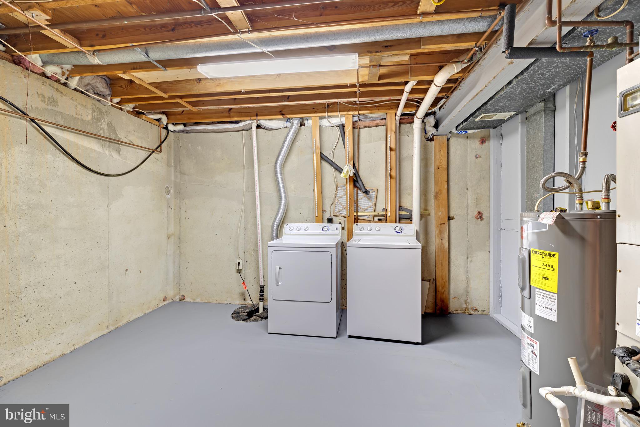 7600 Mandan Road Greenbelt, MD 20770 - Photo 35 of 42 a utility room with dryer and washer
