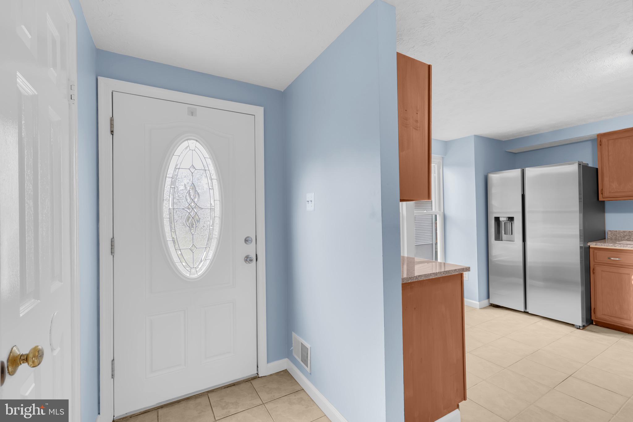 7600 Mandan Road Greenbelt, MD 20770 - Photo 6 of 42 a view of kitchen with stainless steel appliances granite countertop a refrigerator and a sink