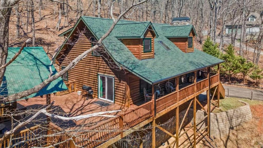 71 Cutthroat Ridge Road Jasper, GA 30143 - Photo 2 of 44 an aerial view of a house with a yard