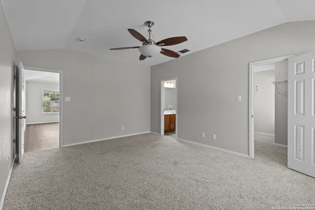 a view of an empty room and window