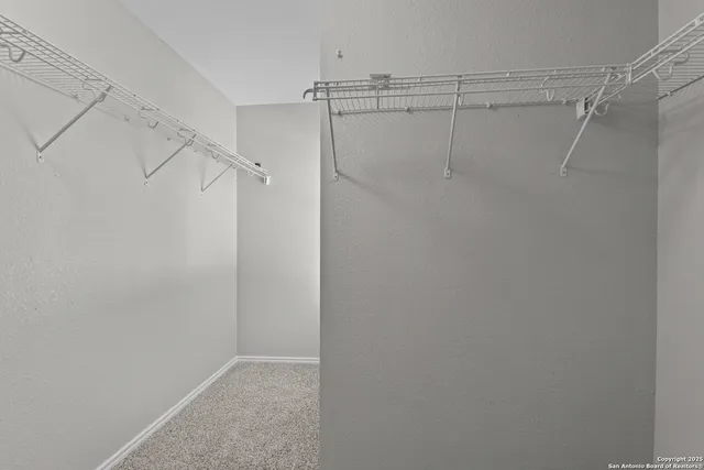 a view of a room with racks on the wall