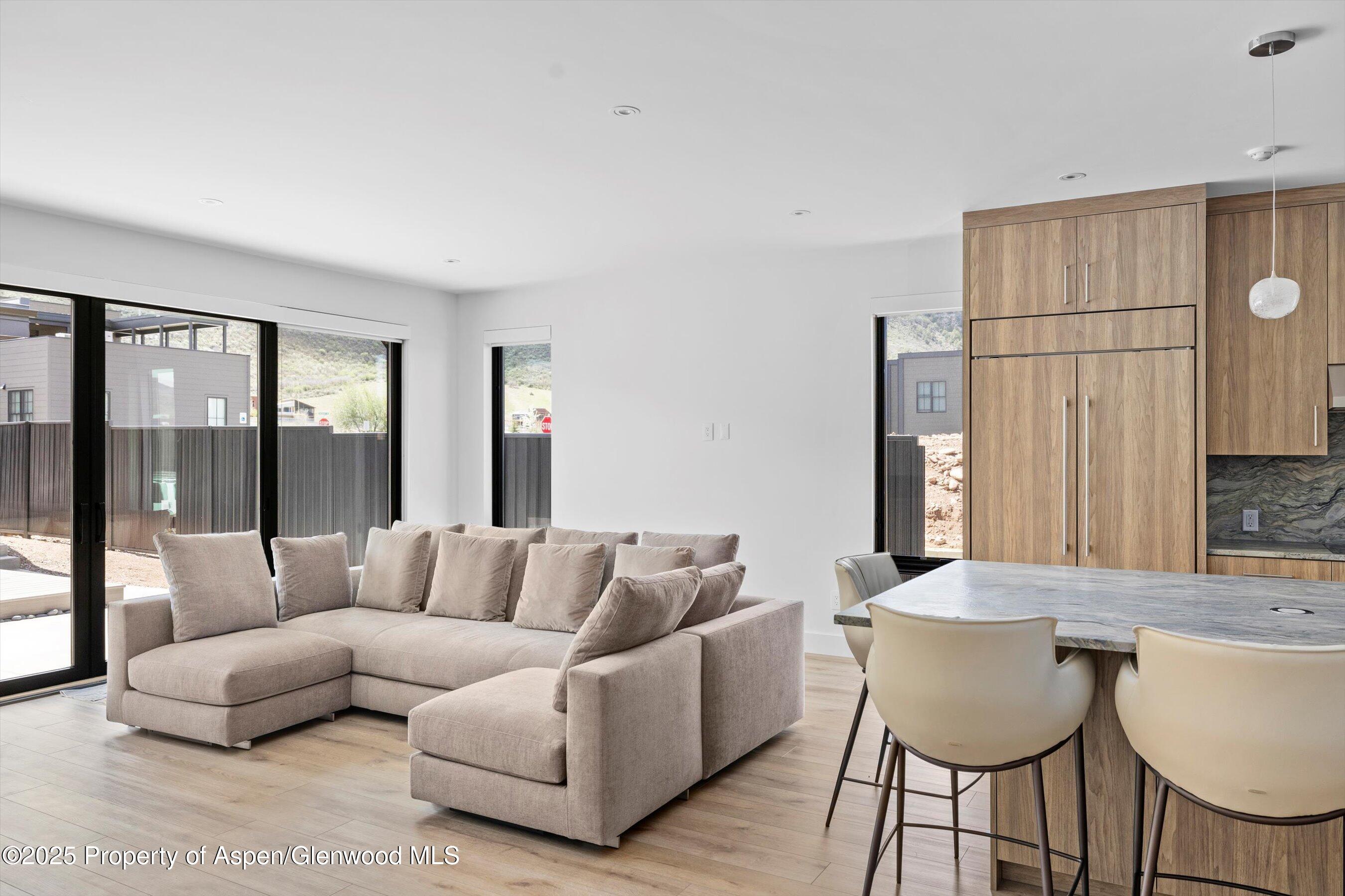 337 Stotts Mill Road Basalt, CO 81621 - Photo 2 of 24 a living room with furniture and a large window