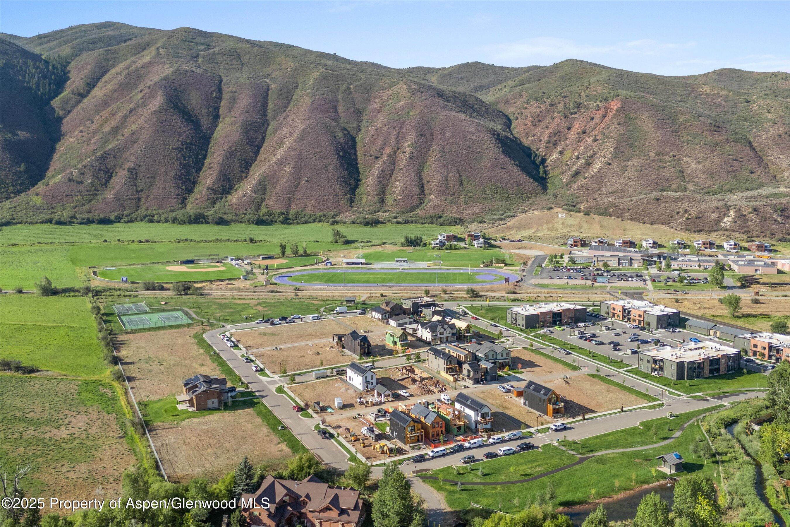 337 Stotts Mill Road Basalt, CO 81621 - Photo 21 of 24 a view of a lush green hillside and houses