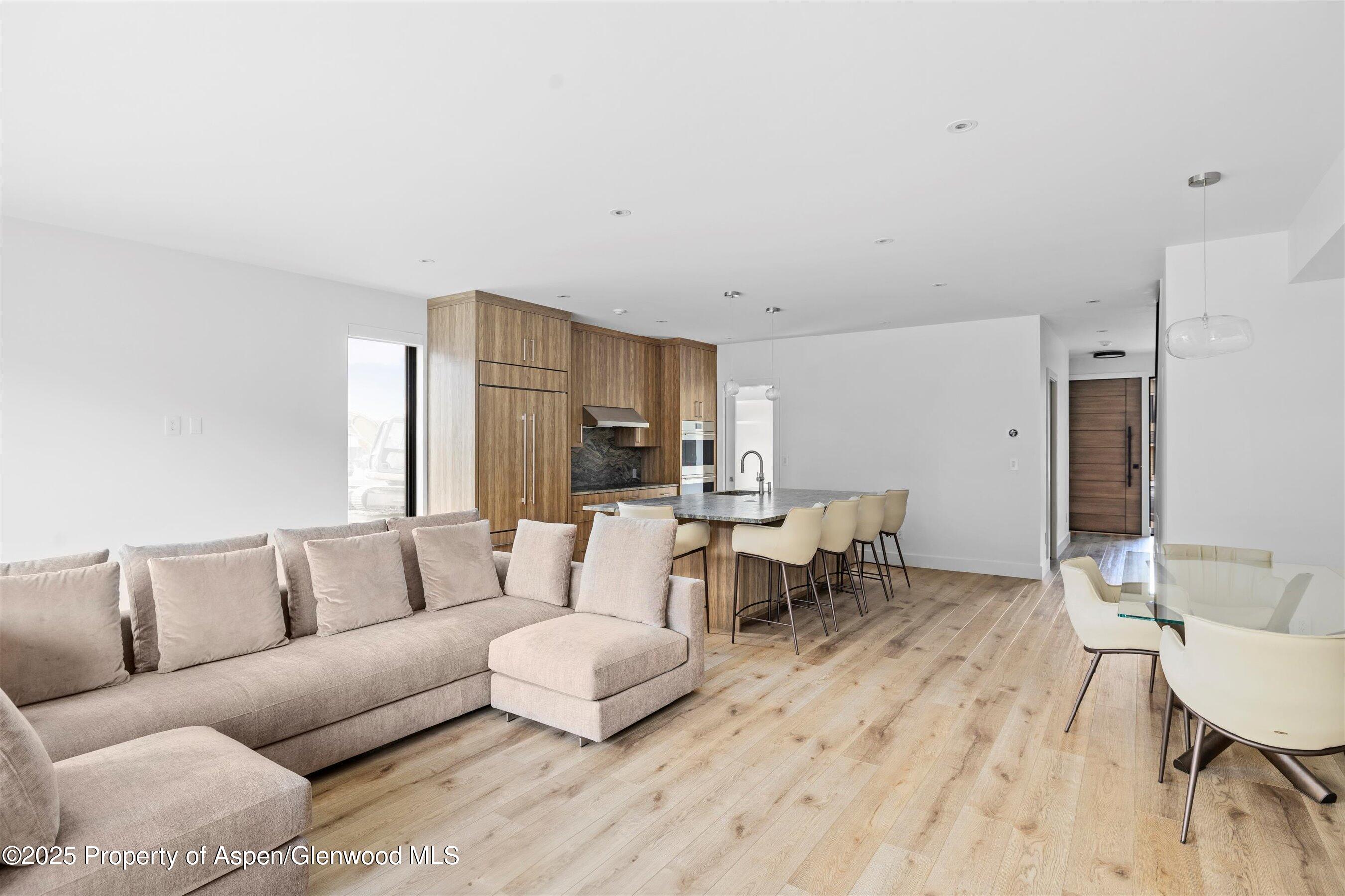 337 Stotts Mill Road Basalt, CO 81621 - Photo 3 of 24 a living room with furniture and a wooden floor