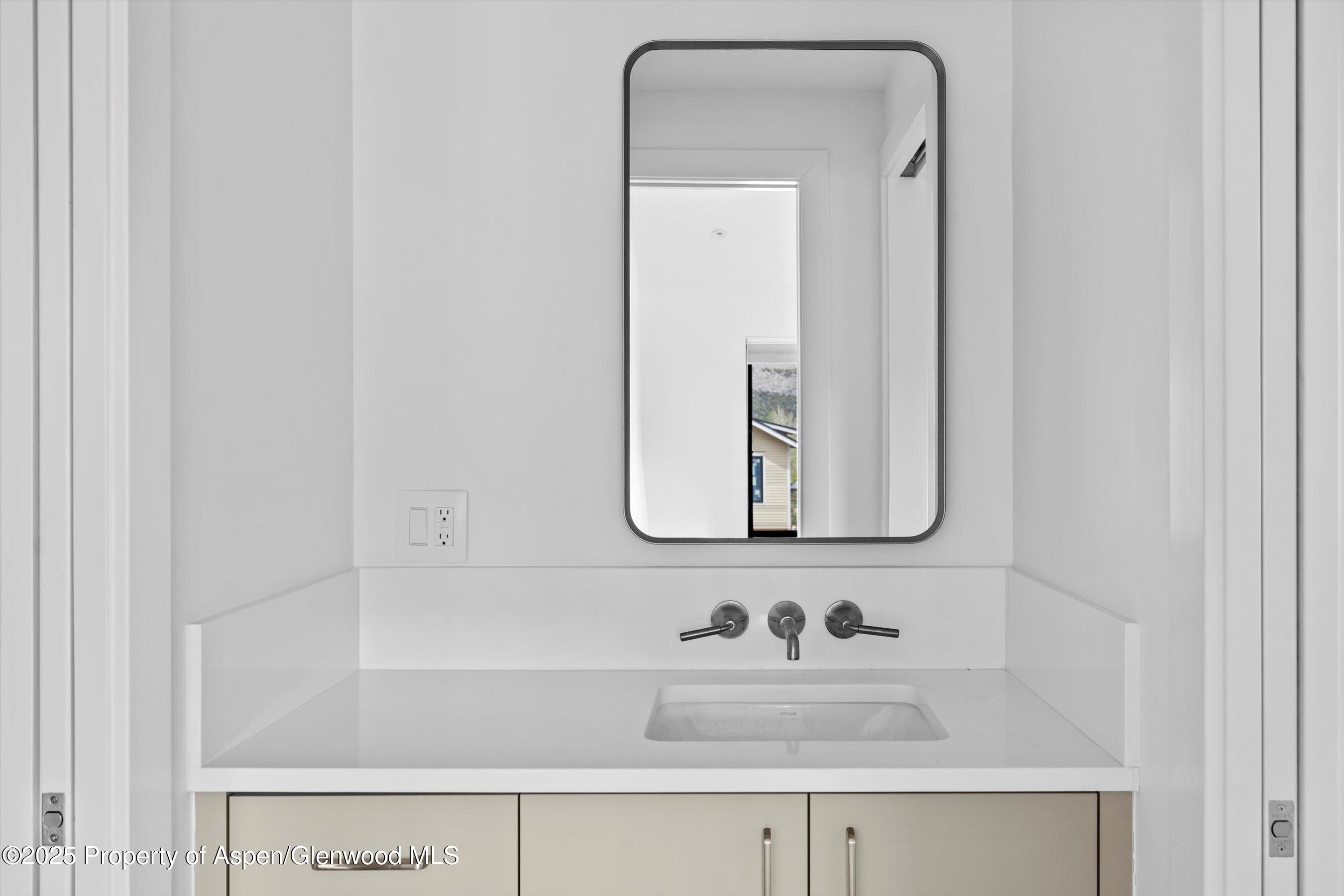 337 Stotts Mill Road Basalt, CO 81621 - Photo 10 of 24 a bathroom with a sink and a mirror