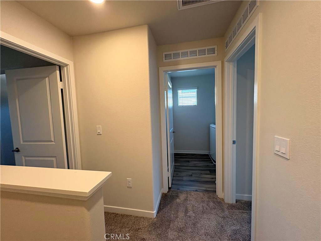 9511 Hannah Way Riverside, CA 92503 - Photo 14 of 24 Third Level Hallway