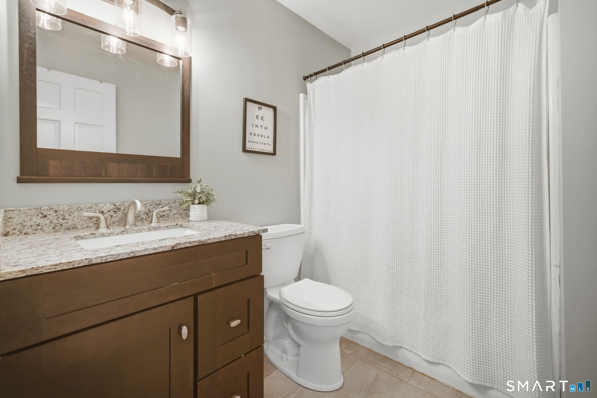 174 Walnut Hill Road Hartland, CT 06027 - Photo 25 of 36 a bathroom with a granite countertop sink toilet and mirror