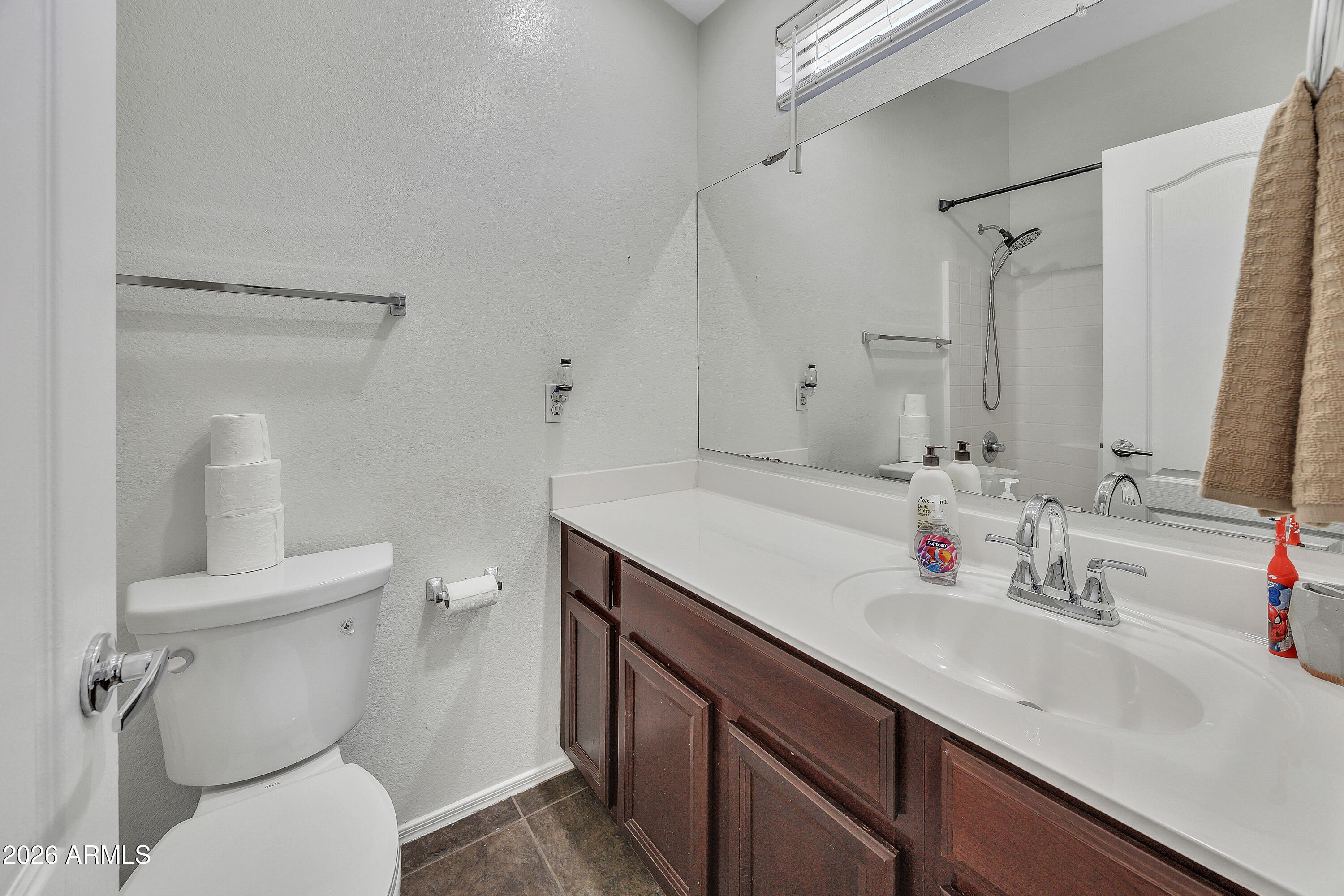 280 South Evergreen Road, Unit 1263 Tempe, AZ 85288 - Photo 16 of 32 a bathroom with a sink toilet and shower