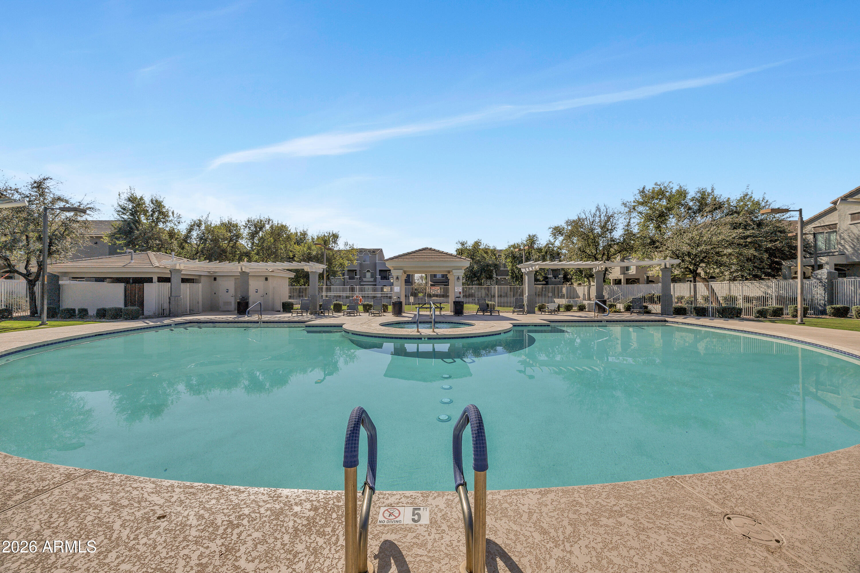 280 South Evergreen Road, Unit 1263 Tempe, AZ 85288 - Photo 23 of 32 a view of a lake with a yard