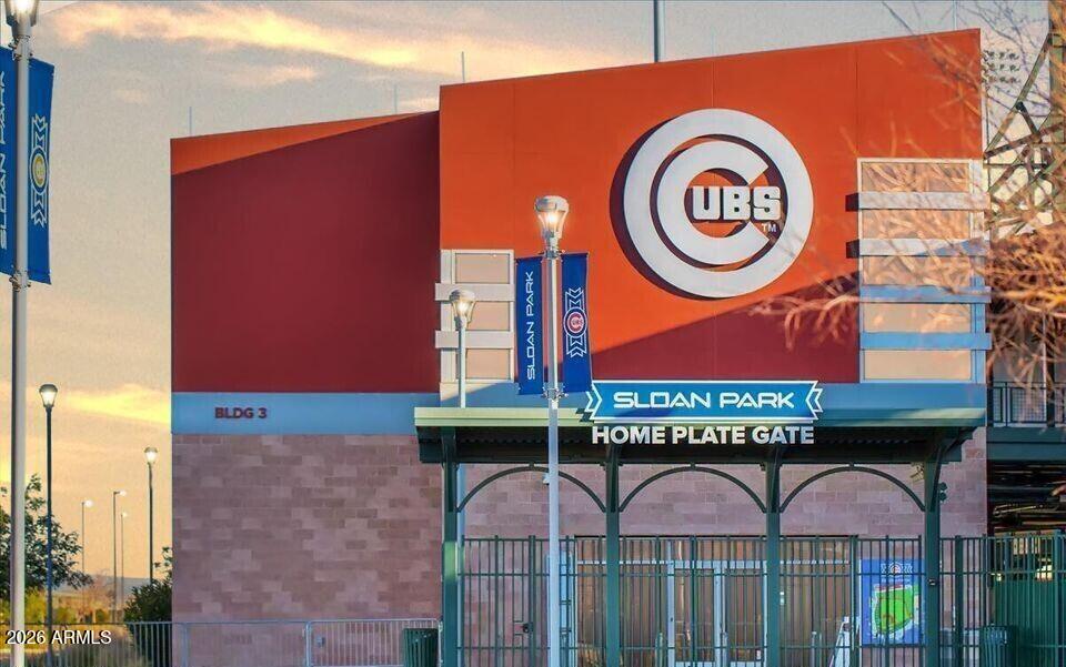 280 South Evergreen Road, Unit 1263 Tempe, AZ 85288 - Photo 25 of 32 a sign on a brick wall with a street sign on the wall