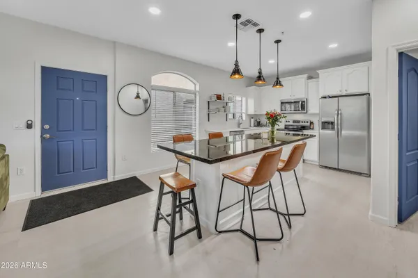a view of a dining room with furniture