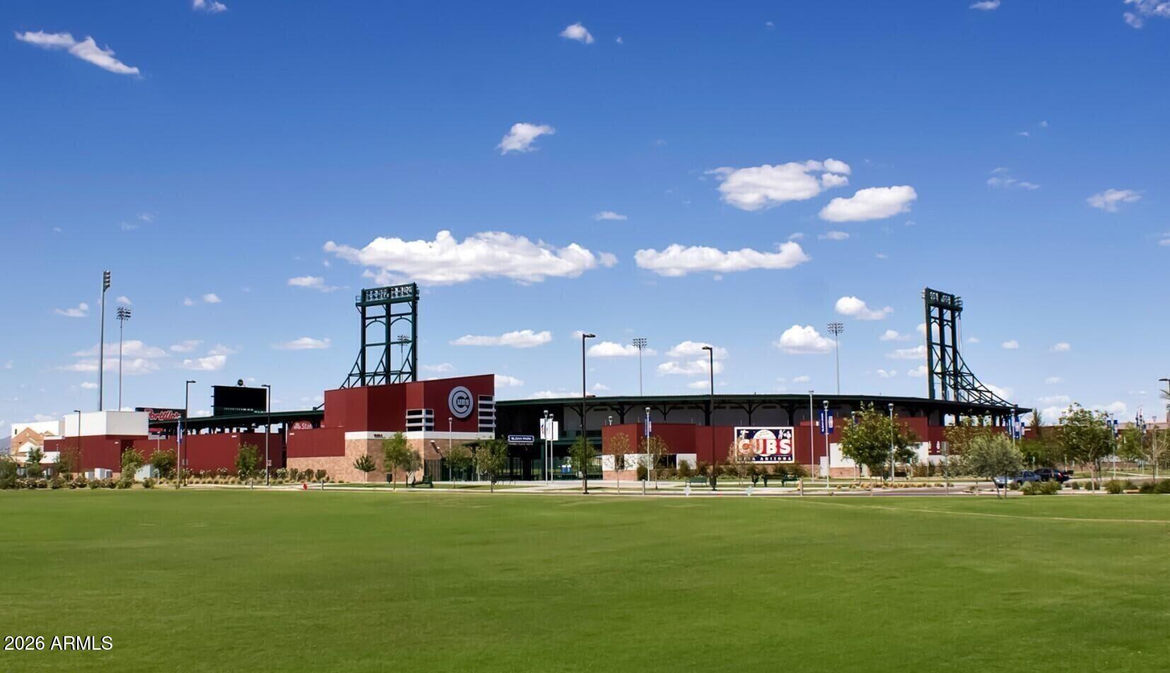 280 South Evergreen Road, Unit 1263 Tempe, AZ 85288 - Photo 32 of 32 a front view of a building with a garden