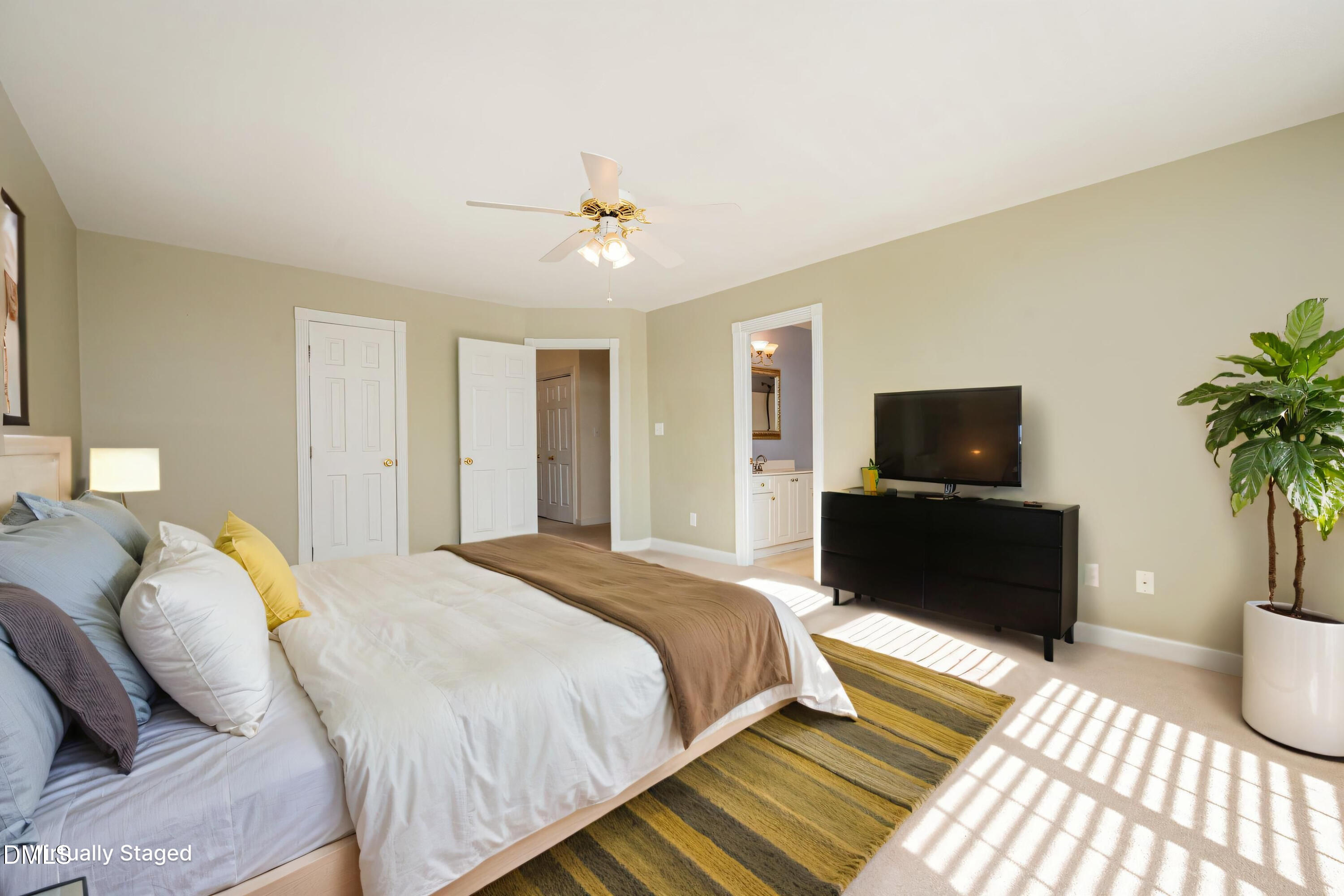 118 Grande Meadow Way Cary, NC 27513 - Photo 22 of 33 a bedroom with a bed and a television