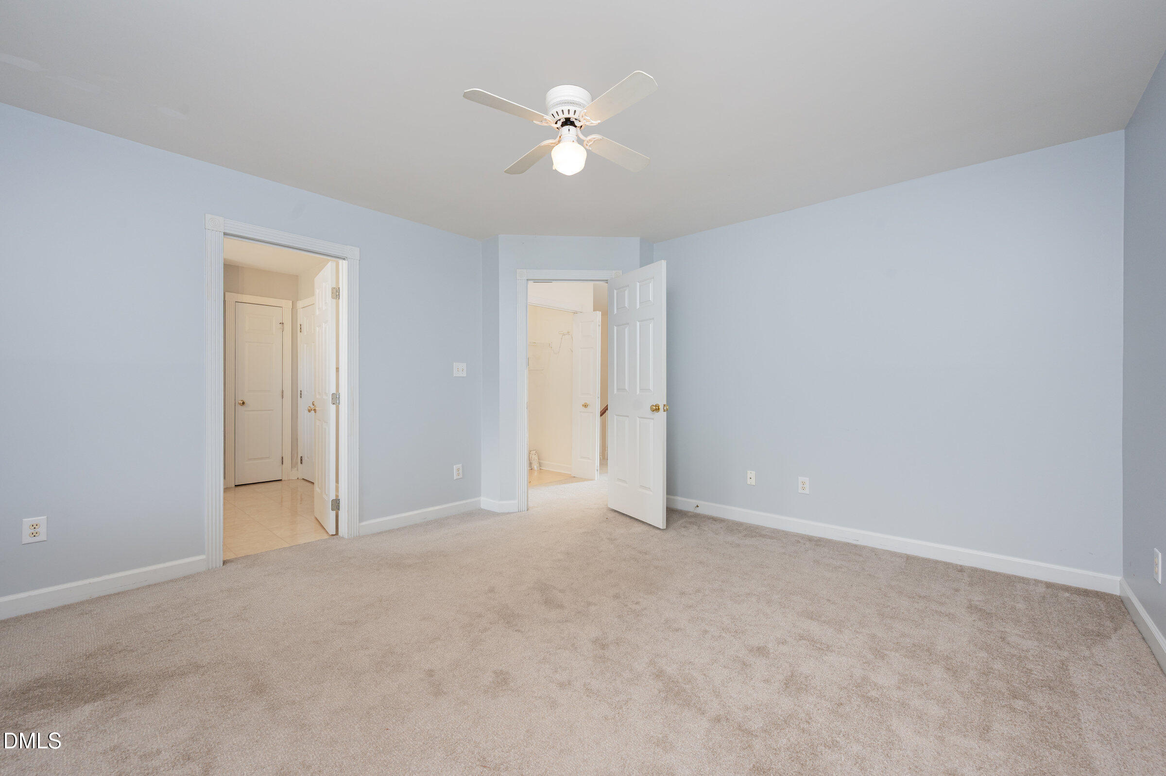 118 Grande Meadow Way Cary, NC 27513 - Photo 25 of 33 a view of an empty room with a ceiling fan and window
