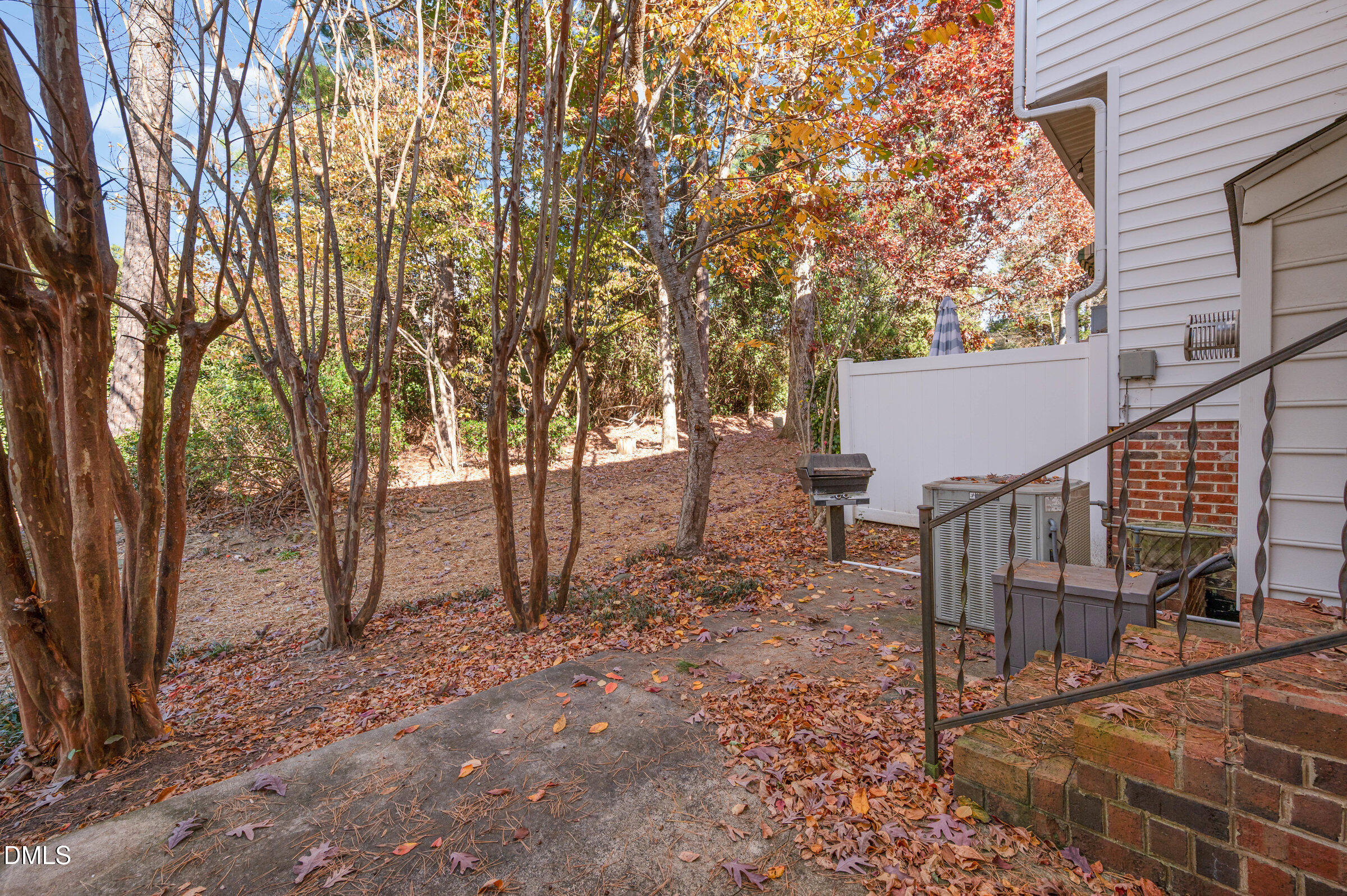 118 Grande Meadow Way Cary, NC 27513 - Photo 29 of 33 a view of a house with backyard and trees
