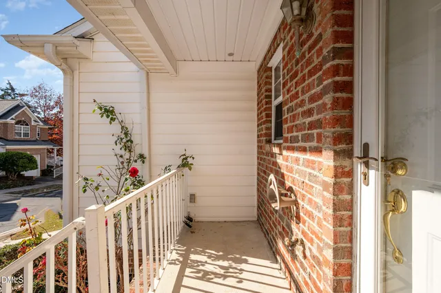 a view of a house with wooden floor and windows