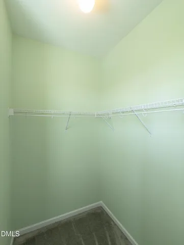 a view of a building with a window and stairs