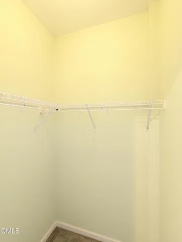 a view of a house with a back yard