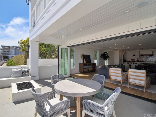 a outdoor space with a couch and chairs