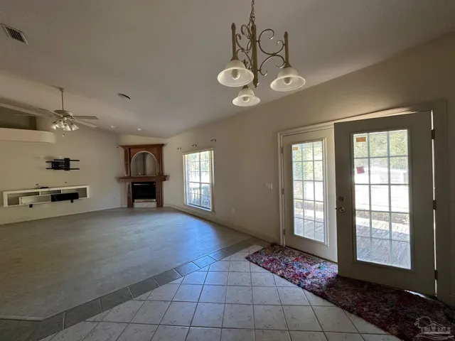 an empty room with windows