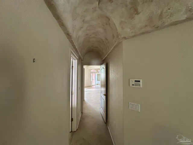 a view of a swimming pool from a balcony