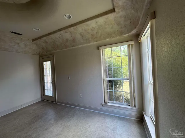 a bathroom with a shower and a shower