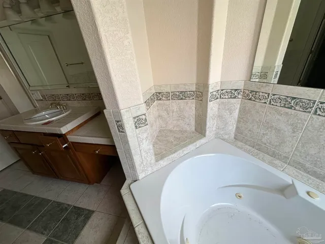 a sign that is sitting in the middle of a yard