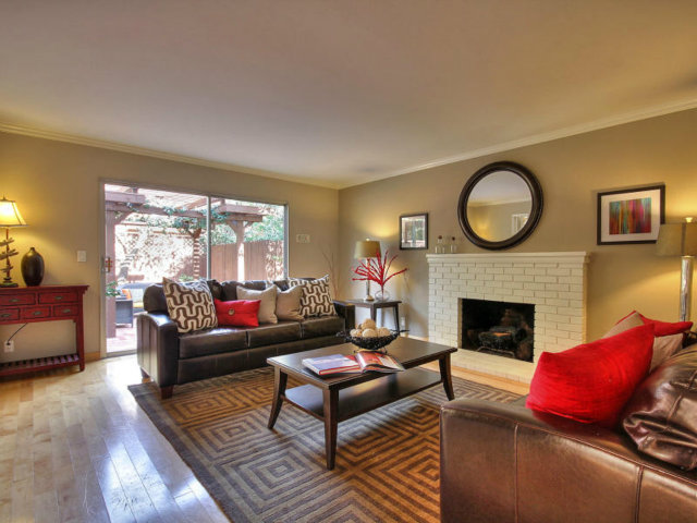 766 Rustic Lane Mountain View, CA 94040 - Photo 13 of 23 a living room with furniture and a fireplace