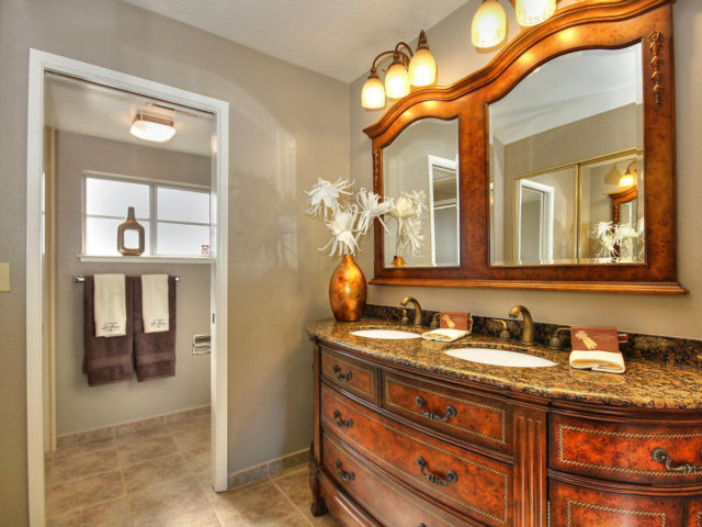 766 Rustic Lane Mountain View, CA 94040 - Photo 17 of 23 a bathroom with a sink and a mirror