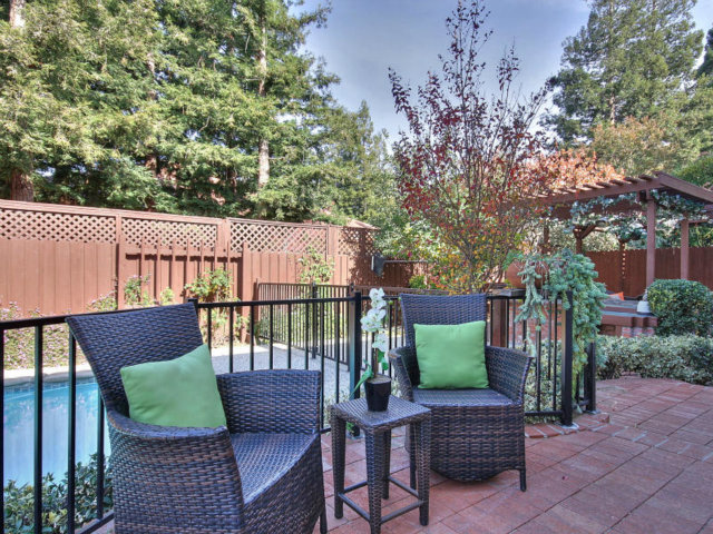766 Rustic Lane Mountain View, CA 94040 - Photo 21 of 23 a view of a deck with furniture and a yard
