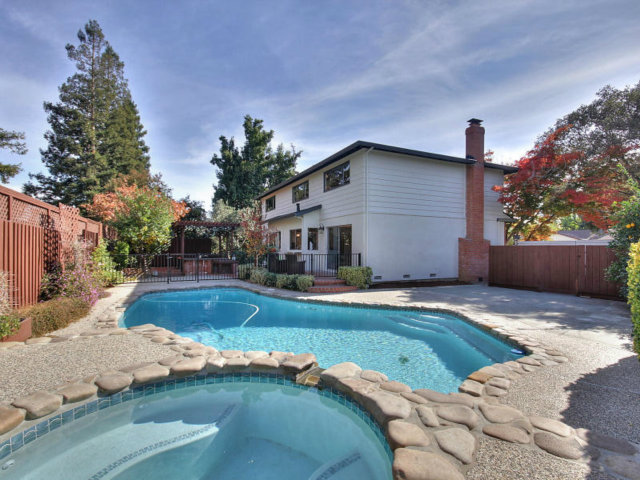 766 Rustic Lane Mountain View, CA 94040 - Photo 22 of 23 a front view of a house with garden